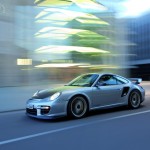 2011 Silver Porsche 911 GT2 RS wallpaper Side angle view