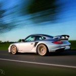 2011 Silver Porsche 911 GT2 RS wallpaper Side angle view