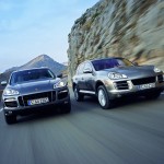 Porsche Cayenne 2008 1600x1200 wallpaper Front view Two Porsches