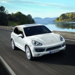 White Porsche Cayenne 2011 1600x1200 wallpaper Front angle view