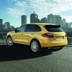 Yellow Porsche Cayenne 2011 1600x1200 wallpaper Rear angle view
