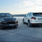 Porsche Cayenne 2011 1600x1200 wallpaper Two Porsches
