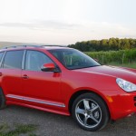 Red Porsche Cayenne S Titanium 2006 1600x1200 wallpaper Side angle view