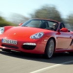 2009 Guards Red Porsche Boxster S wallpaper Front angle view