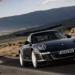 2011 Black Porsche 911 Carrera 4 Wallpaper Front angle view