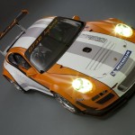 2011 Orange Porsche 911 GT3 R Hybrid 2.0 Front angle view