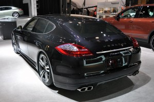 2011 black Porsche Panamera Turbo S at New York Autoshow Rear angle view