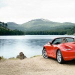 2011 Guards Red Porsche Boxster S wallpaper Rear angle view
