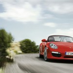 2011 Guards Red Porsche Boxster S wallpaper Front angle view