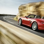 2011 Guards Red Porsche Boxster S wallpaper Side angle view