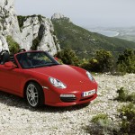 2011 Guards Red Porsche Boxster S wallpaper Front angle view