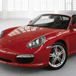 2011 Guards Red Porsche Boxster S wallpaper Front angle view