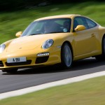2009 Yellow Porsche 911 Carrera Wallpaper Front angle side view